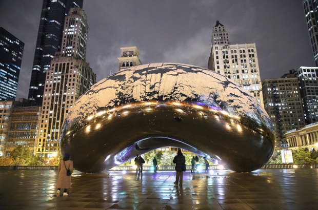 More photogenic sculpture: Chicago's first snow fall of the season sticks to Anish Kapoor's Cloud Gate (also known as The Bean) in Milennium Park.