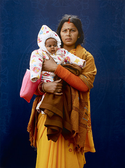 Taylor Wessing Prize 2013: Kumbh Mela Pilgrim - Mamta Dubey and infant  by Giles Price