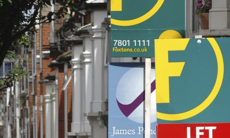 Estate agent signs in London