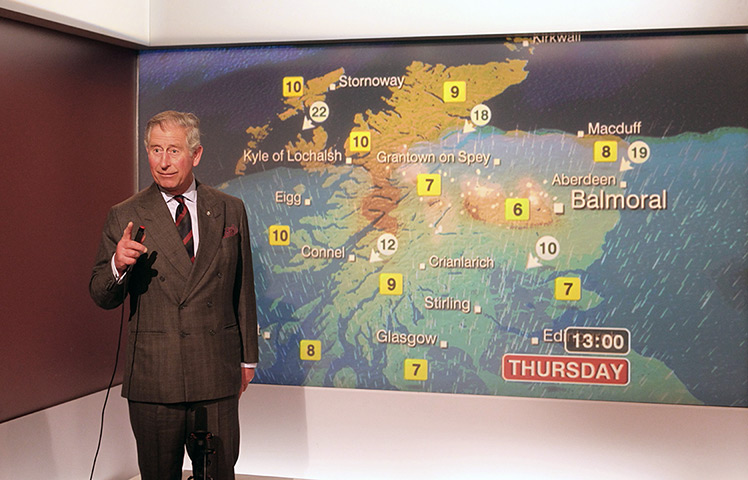 Charles's moments: Prince Charles reads the weather in the Six O'Clock studio whilst on a tour