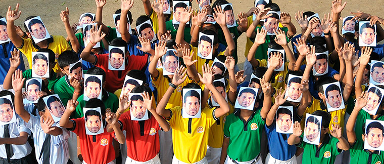 Tendulkar's last hurrah: Indian school students wear masks of Sachin Tendulkar