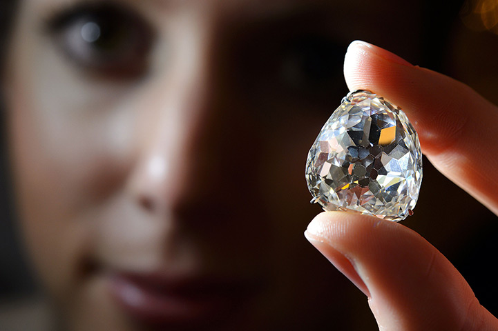 Diamonds: A model poses with the Beau Sancy diamond during a Sotheby's auction previe