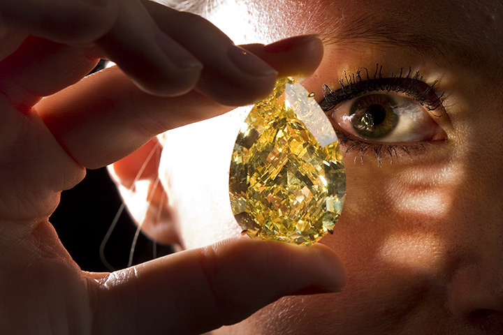 Diamonds: A model poses with the Sun-Drop diamond during a press preview of Sotheby's