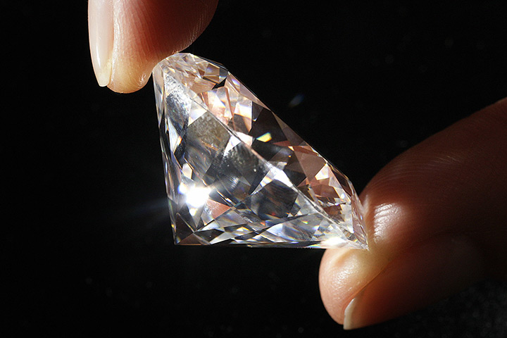 Diamonds: A Sotheby's employee displays the largest brilliant-cut D-color flawless di