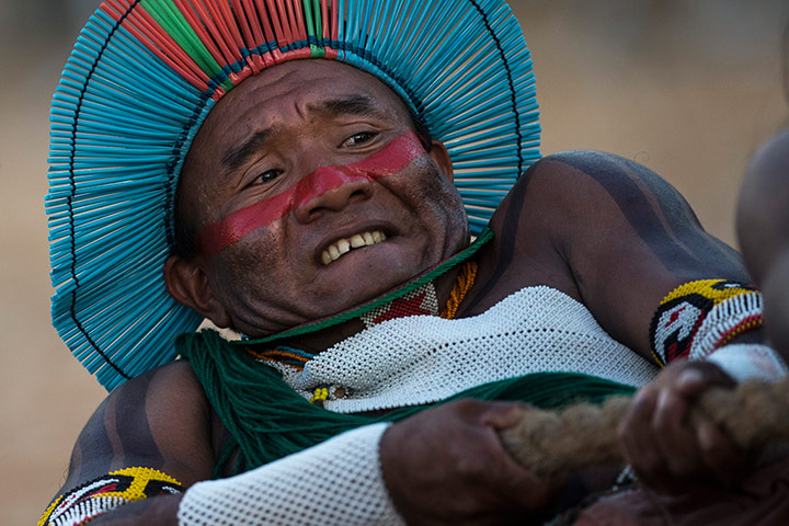 Indigenous Games: A Kayapo Indian takes part in the tug of war competition