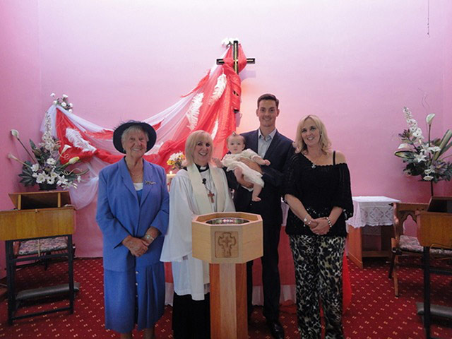 Church congregations: group baptism photo