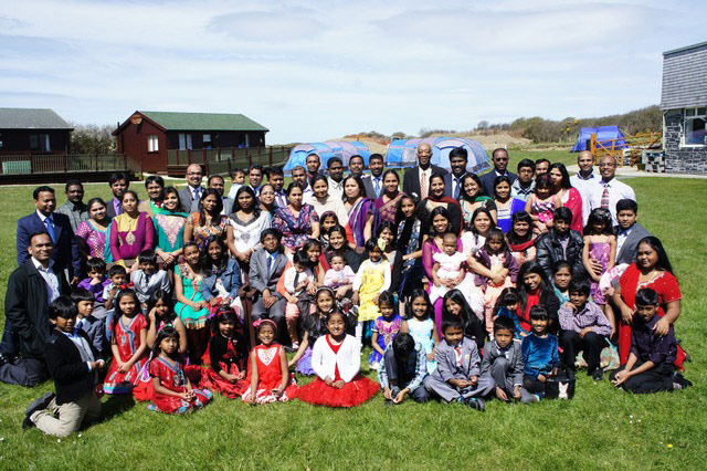 Church congregations: southern asia colourful dress