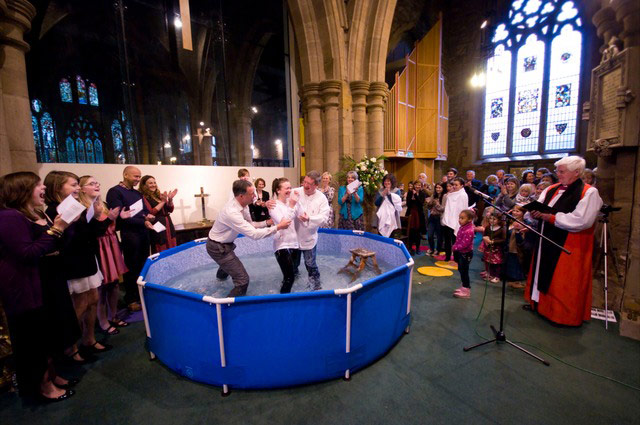 Church congregations: immersion baptism in pool
