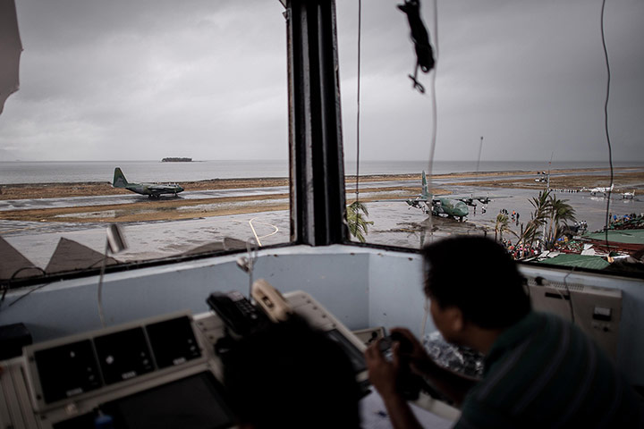 20 Photos: A Filipino civil aviation personnel mans