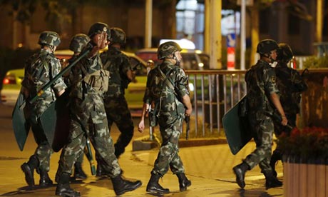 A government paramilitary patrol in Xinjiang