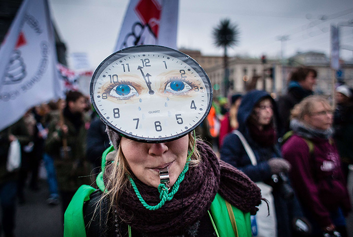 Weekend in pictures: Warsaw, Poland: Environmental activists march during the UN COP19 climate change conference