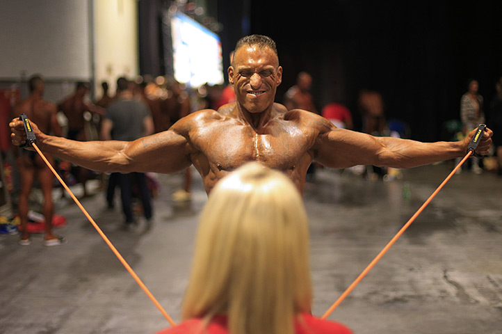 Weekend in pictures: St Pölten, Austria: Germany's Bernd Ebert prepares backstage during the World Classic Bodybuilding Championship