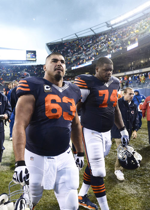 Chicago Bears players leave the field