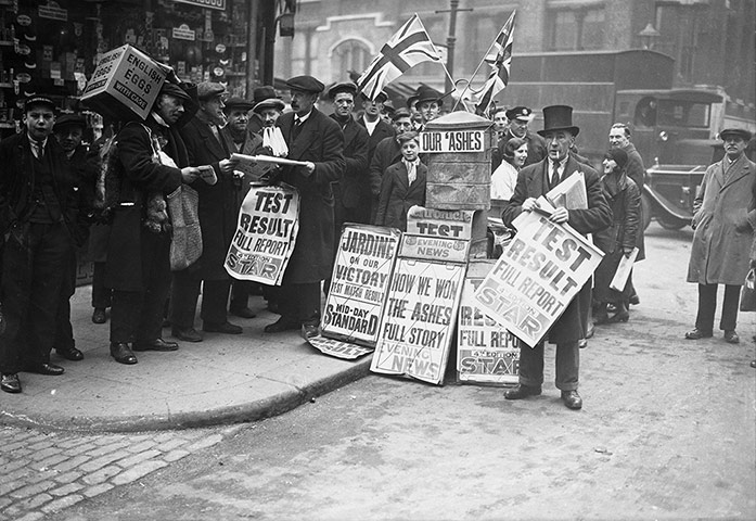 Ashes down under: 1933 Newspaper Seller in the Street