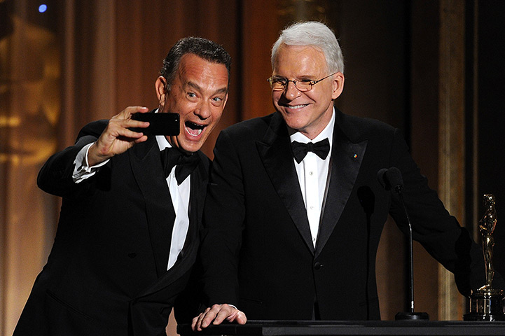 Governors Awards : Tom Hanks presents Steve Martin with honorary award onstage 