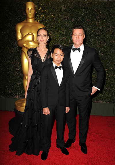 Governors Awards : Angelina Jolie, Maddox Jolie-Pitt and Brad Pitt arrives at Dolby Theatre