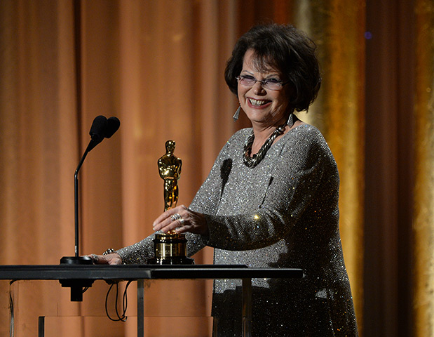 Governors Awards : Italian actress Claudia Cardinale accepts the honorary award for costume de