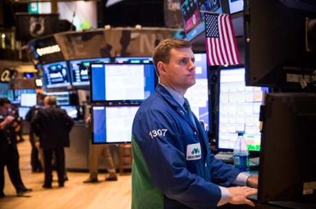 A trader works on the floor of the New York Stock Exchange.