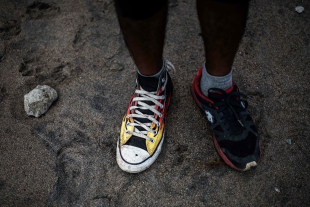 he feet of a typhoon survivor photographed on the outskirts of one of the hardest hit areas, Tacloban on the Philippine island of Leyte. 