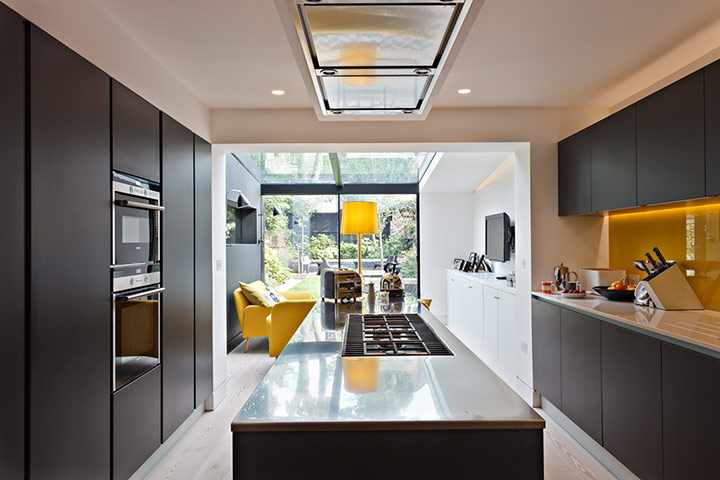 Homes - Lighten Up: interior of brown and yellow kitchen