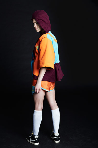 Nike gallery: young female standing back turned