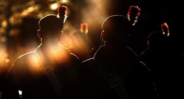Captured in the low winter sunlight, soldiers from the 1st Battalion the Royal Regiment of Fusiliers, parade through Bury town centre, the home town of murdered Fusilier, Lee Rigby, of the 2nd Battalion the Royal Regiment of Fusiliers, following their tour of duty in Afghanistan.