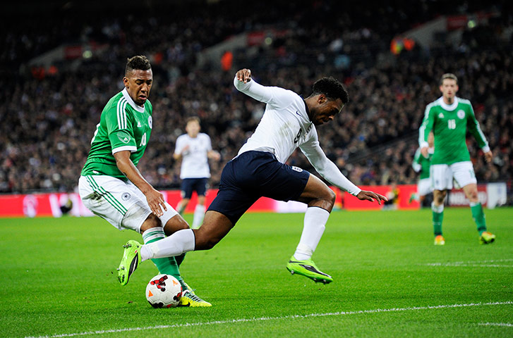 England v Germany: Daniel Sturridge is tackled
