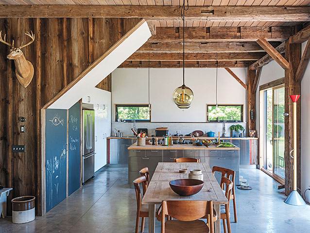 Homes - Remodelista: Kitchen and dining area of house made from wood and metal