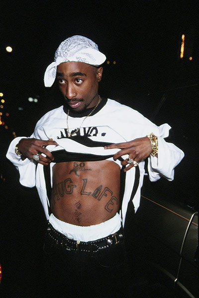 10 best: Tupac Shakur showing his stomach tattoo
