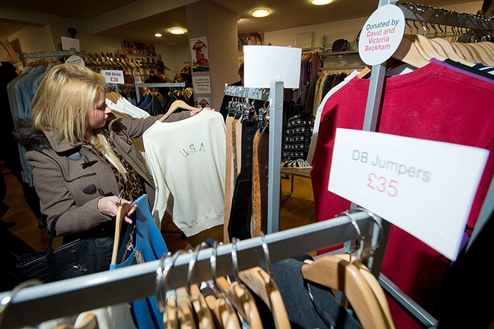 Beckhams' clothes sale: A shopper looks through the rails of clothes