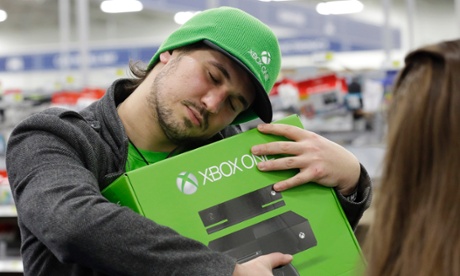 Emanuel Jumatate hugs his new Xbox One