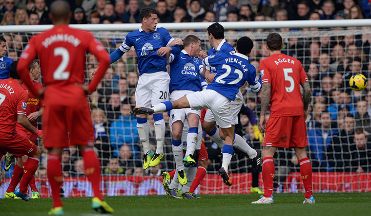 Merseyside derby: Luis Suarez scores with a freekick
