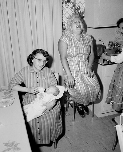 Big Picture - Revising : black and white image of women in kitchen with baby