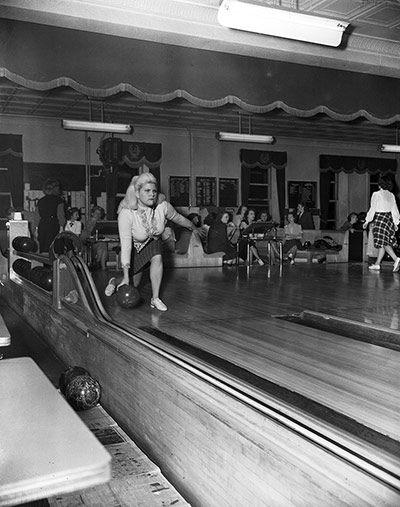 Big Picture - Revising : black and white photo of woman bowling