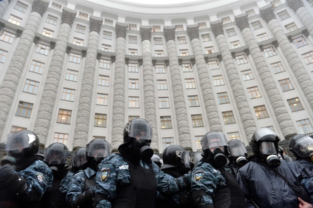 Riot policemen standing guard in front of the Ukrainian Cabinet of the Ministers make an imposing sight during a protest in Kiev. Ukrainians staged the biggest protest rally in Kiev since the 2004 Orange Revolution demanding that the government sign a key pact with the European Union.