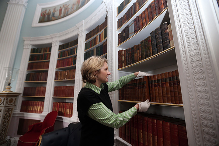Kenwood House: English Heritage curator Laura Houliston, replaces books in the library