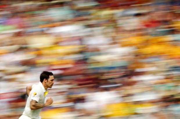 Mitchell Johnson of Australia looks as though he's the subject of an impressionist painting as he runs in to bowl during day two of the First Ashes Test match between Australia and England at The Gabba in Brisbane.