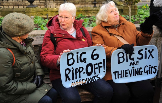 Serving it up on a tea tray, these demonstrators make their feelings clear before a march to the headquarters of energy company npower during a protest against energy prices in London.