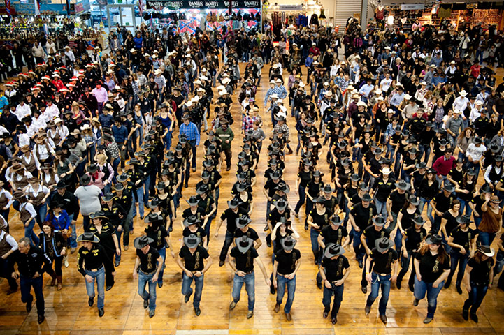 Big Picture - Spaghetti: line-up of people dressed as cowboys