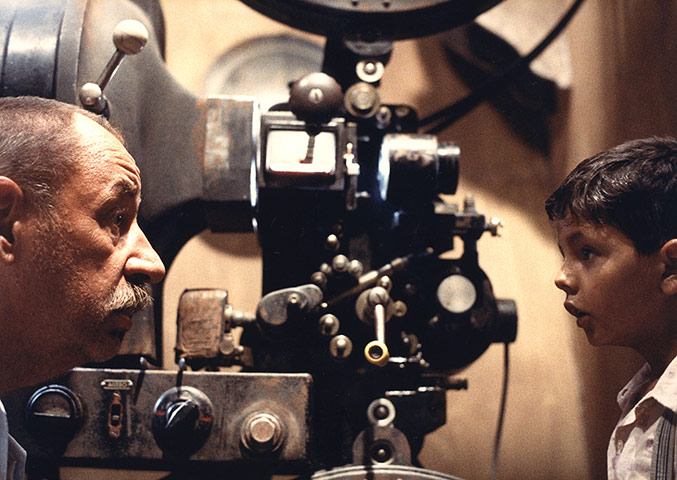 Cinema Paradiso gallery: Cinema Paradiso: Salvatore with Alfredo, the cinema's projectionist