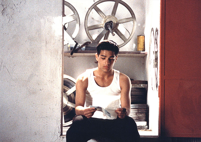 Cinema Paradiso gallery: Cinema Paradiso: Salvatore as a young man in the projection room