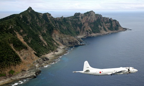 A Japanese aircraft flies over the Senkaku Islands.