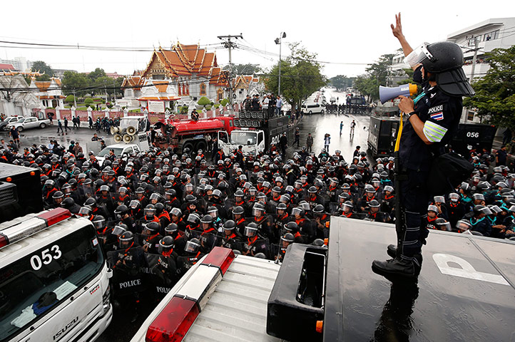 Thailand protests: Thai riot police officers secure the area
