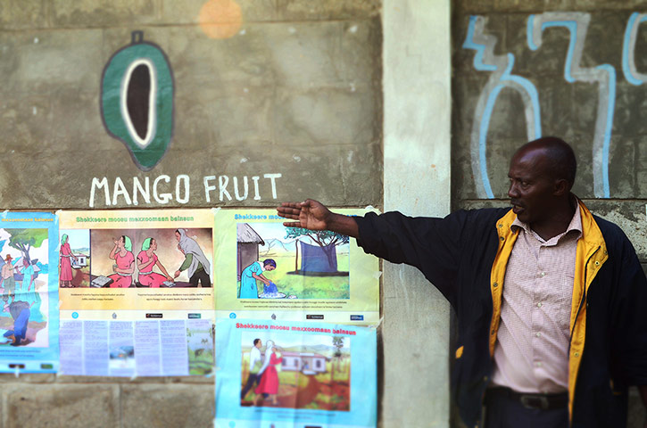 Malaria Consortium pics: Ethipian man pointing