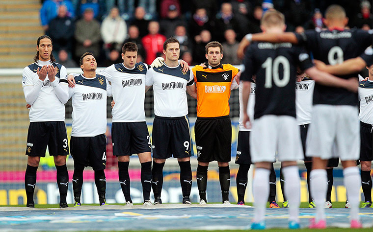 Clutha crash: Players line up for a minute's silence before the Falkirk v Rangers match