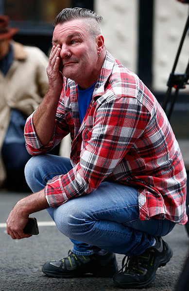 Clutha crash: Paul Watt, a regular at the Clutha pub in Glasgow, wipes his eye