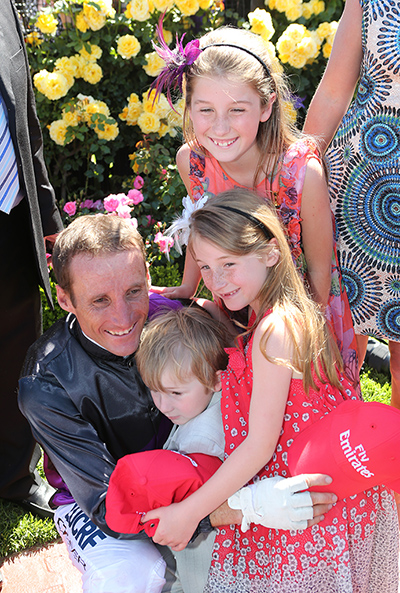 Melbourne Cup: Damien Oliver with his children 