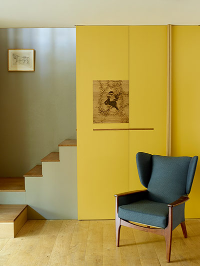 Homes - In With The Old: basement area of period home with yellow wall