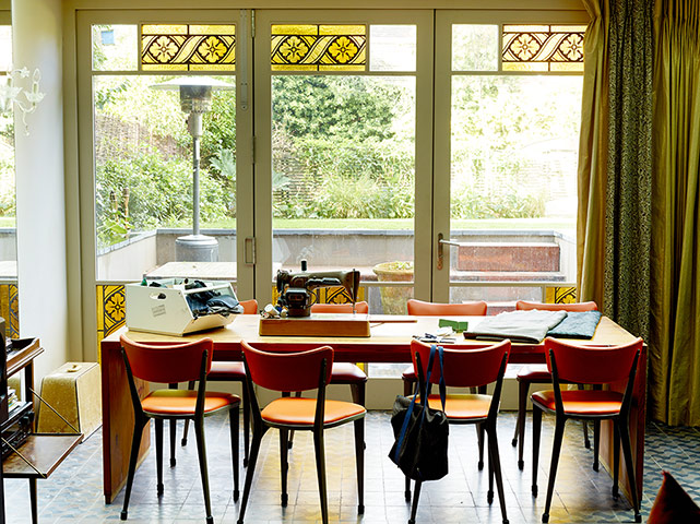 Homes - In With The Old: Dining area with orange chairs