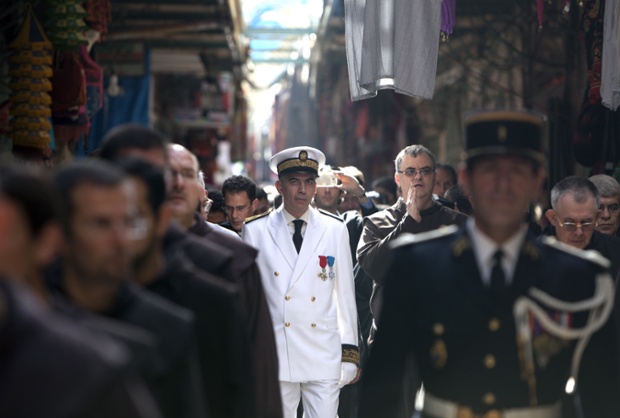Standing out from the crowd the French consul general Frederic Desagneaux joins a traditional procession for the instating of the new French consul in Jerusalem. In his role he follows a centuries-old tradition, pledged today, to defend the Christians of the East.